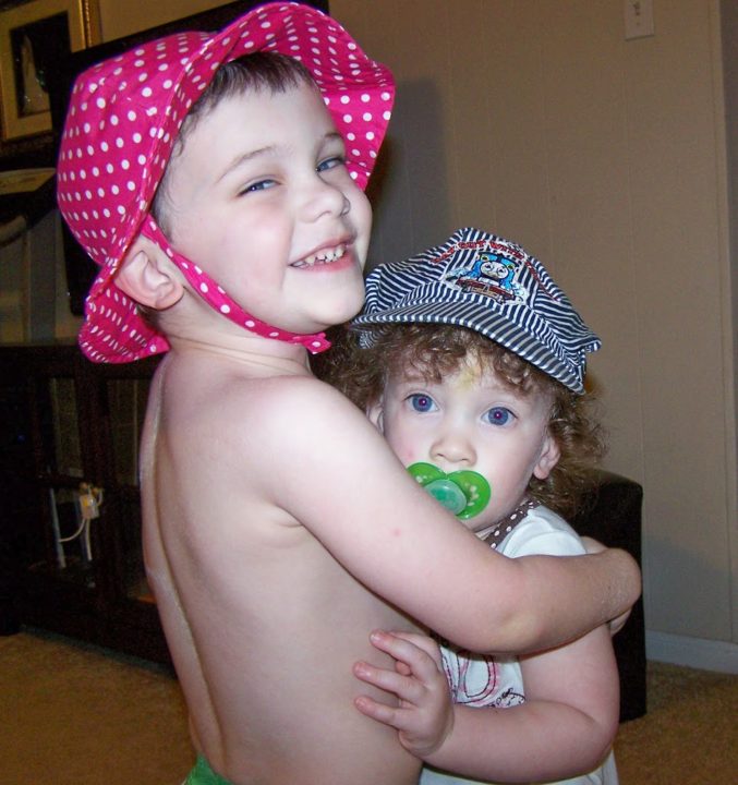 Wordless wednesday- Hat Exchange (It was her idea!!)