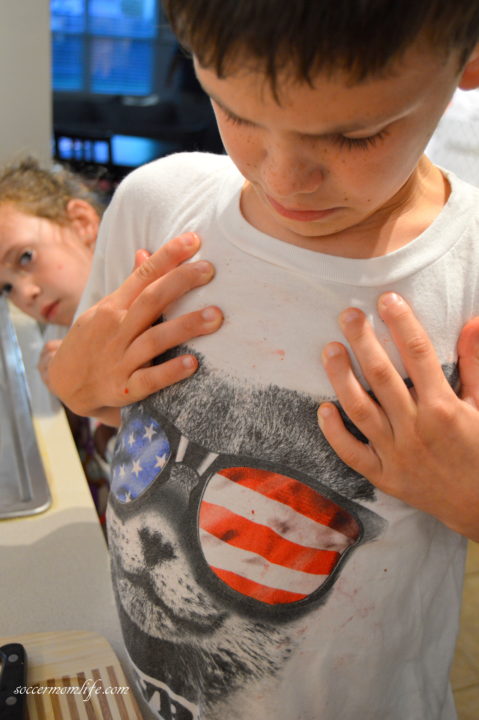 kids using shirt as napkin